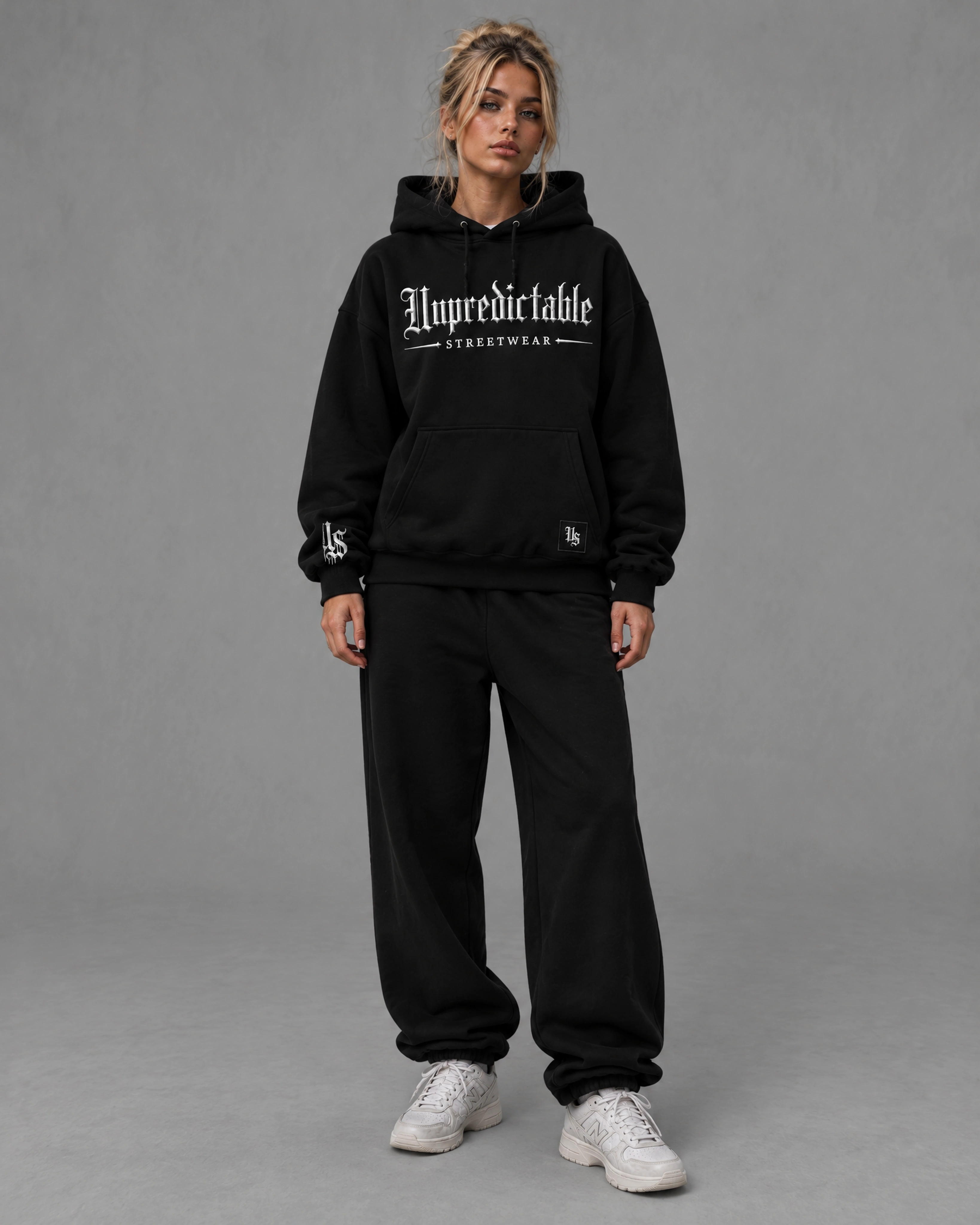 Unpredictable Hoodie — Black — Female model